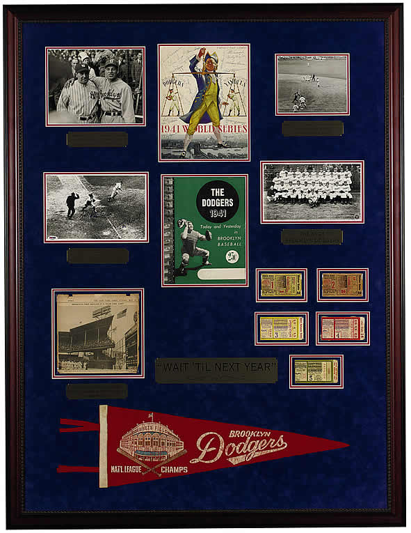 THE 1941 "SUBWAY SERIES" MATCHED THE NEW YORK YANKEES AGAINST THE BROOKLYN dODGERS, WITH THE YANKEES WINNING IN FIVE GAMES TO CAPTURE THEIR FIFTH TITLE IN SIX YEARS. THIS SERIES WAS PUNCTUATED BY THE DODGERS' MICKEY OWENS DROPPED THIRD STRIKE OF A SHARPLY BREAKING CURVEBALL (SUSPECTED SPITBALL) BY HUGH CASEY IN 9TH INNING OF GAME 4. THE PLAY LED TO A YANKEE RALLY AND BROUGH THEM ONE WIN A WAY FROM ANOTHER CHAMPIONSHIP. THE ELEMENTS CAPTURED WITHIN THIS 51 X 39 INCH FRAME DISPLAY COMMEMORATING THIS SERIES INCLUDE AN ORIGINAL WS PROGRAM, FULL SET OF FIVE ORIGINAL SERIES STUBS, VINTAGE DODGERS FELT PENNANT, A 1941 DODGER YEARBOOK, AND VINTAGE WIRE PHOTOS AND A PHOTO SIGNED BY OWEN AND TOM HENRICH OF THE INFAMOUS DROPPED THIRD STRIKE.